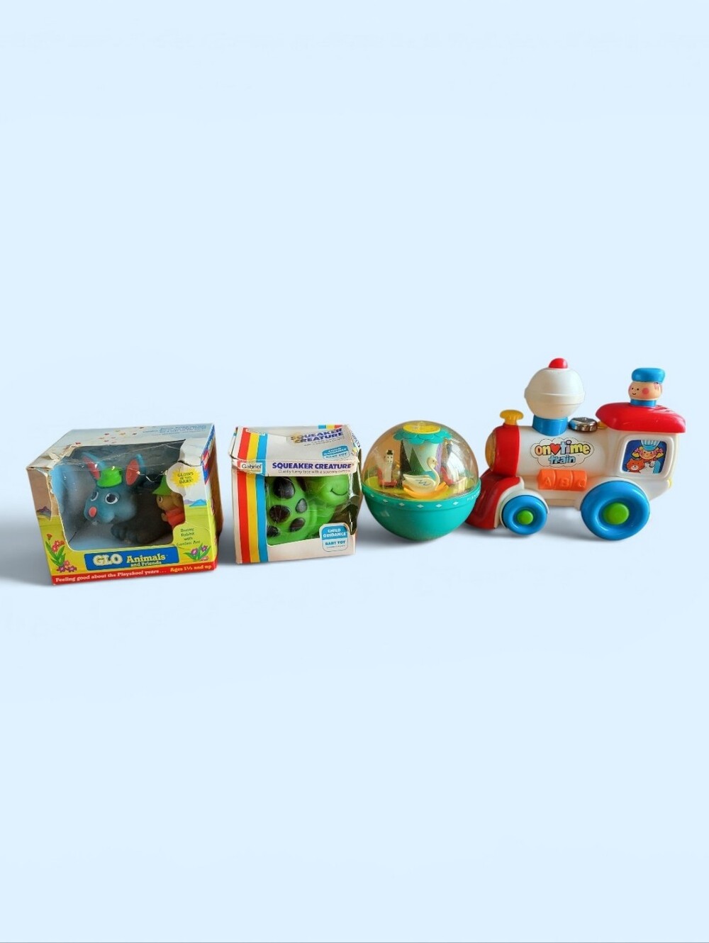 4 Vintage Infant Toys.